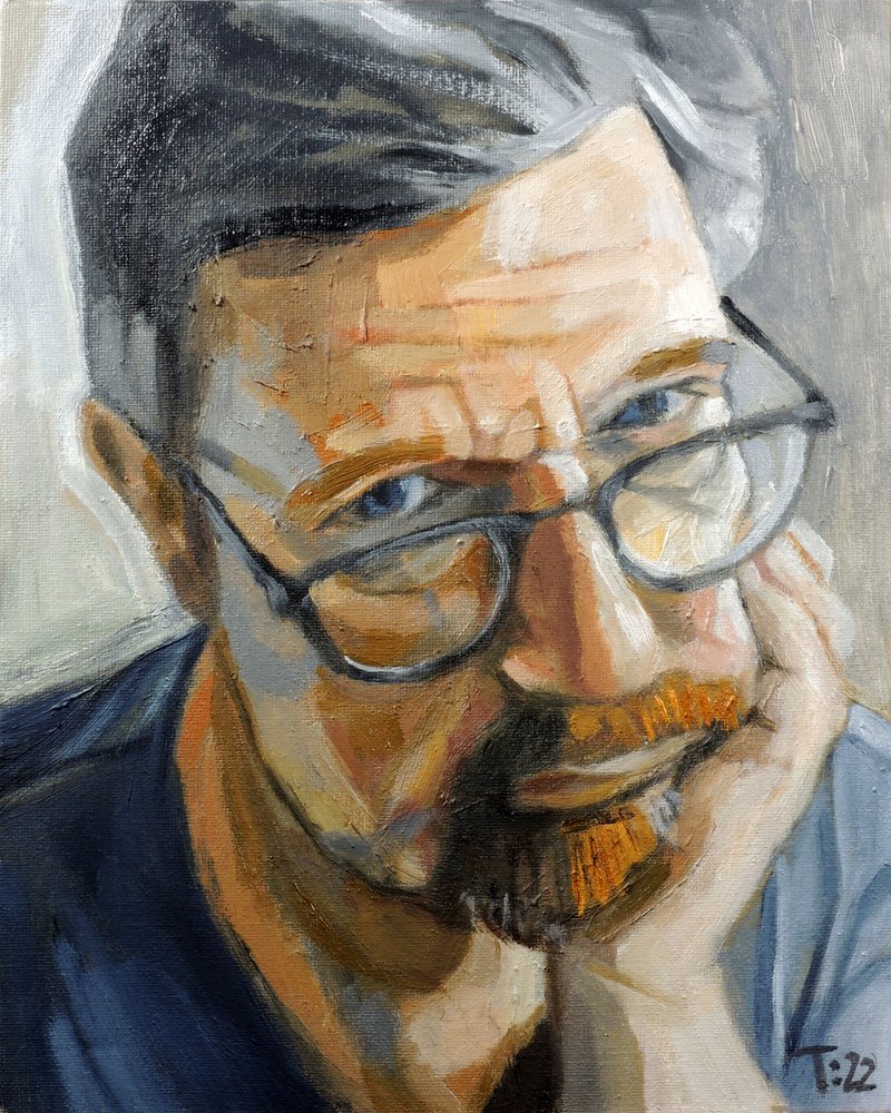 Zamyslenej chlap v brýlích od Tore Bahnson