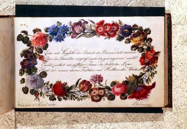 Přední strana knihy návštěv zdobená epigramem v němčině obklopená girlandou z květin, datovaná 1. dubna 1813 (wc) od Austrian School