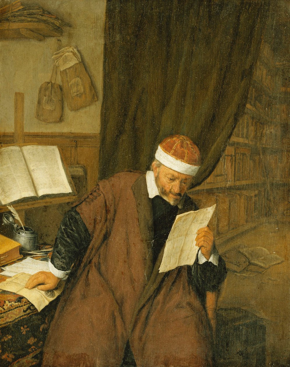 Právník sedící u stolu čte dopis, knihovna dál, 1668 od Adriaen Jansz. van Ostade