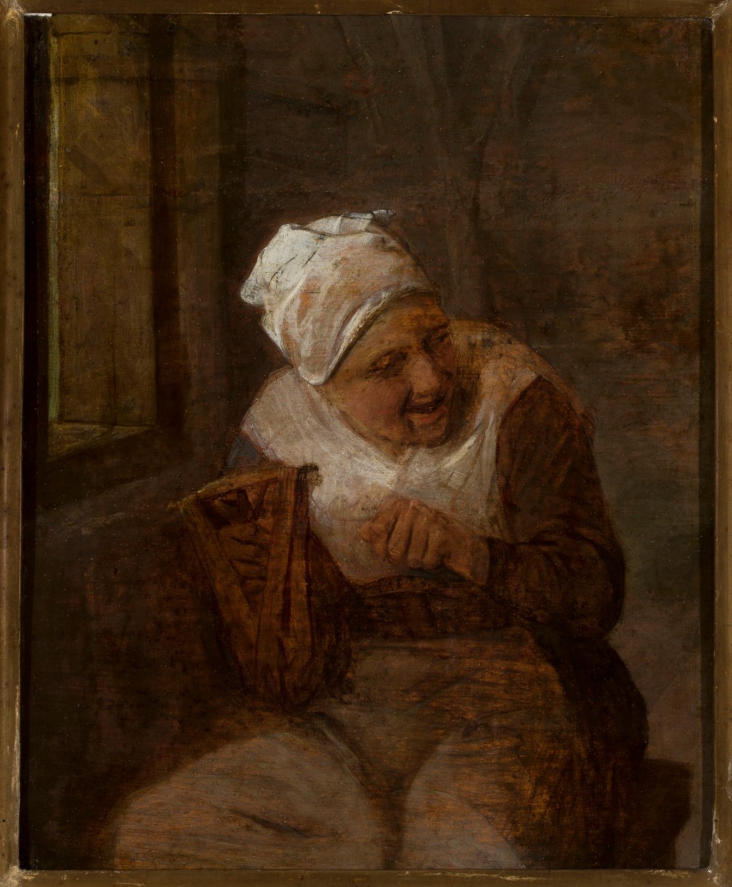 Žena přede u okna od Adriaen van Ostade