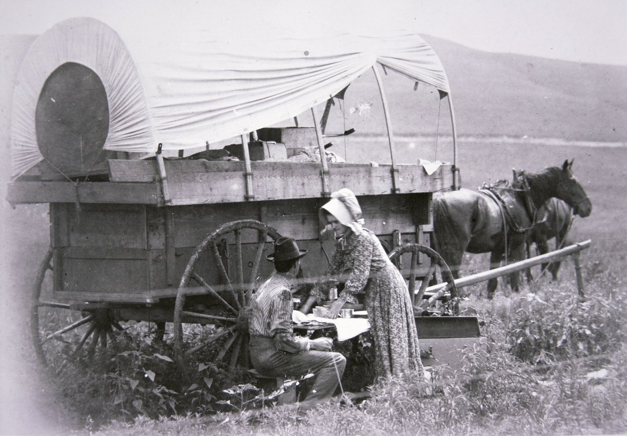 Typický pionýrský krytý vůz (černobílá fotografie) od American Photographer