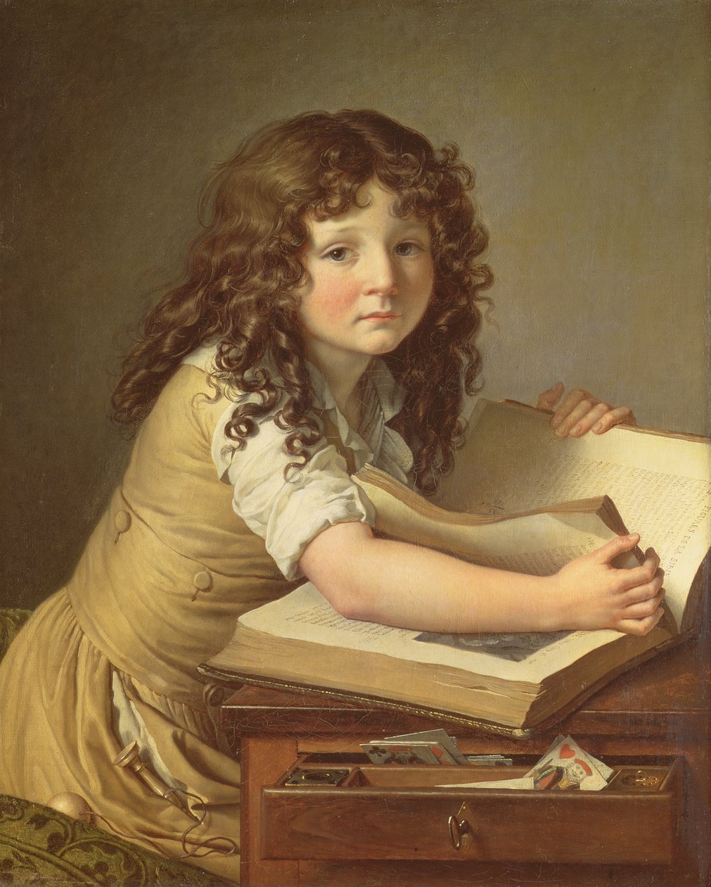 Dítě při pohledu na obrázky v knize od Anne Louis Girodet de Roucy Trioson