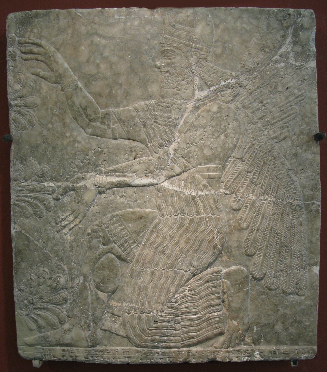 Okřídlené božstvo u posvátného stromu. Reliéf z paláce Ashurnasirpal II v Kalhu, Nimrud, 9. století před naším letopočtem od Assyrian