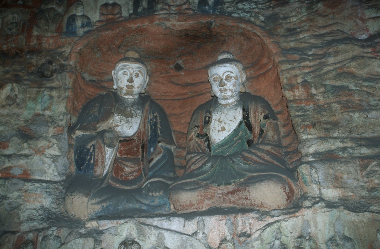 Čína, provincie Shanxi, pískovcové sochy Buddhy v jeskyních Yungang od J.B. and Brown J. Rowbotham