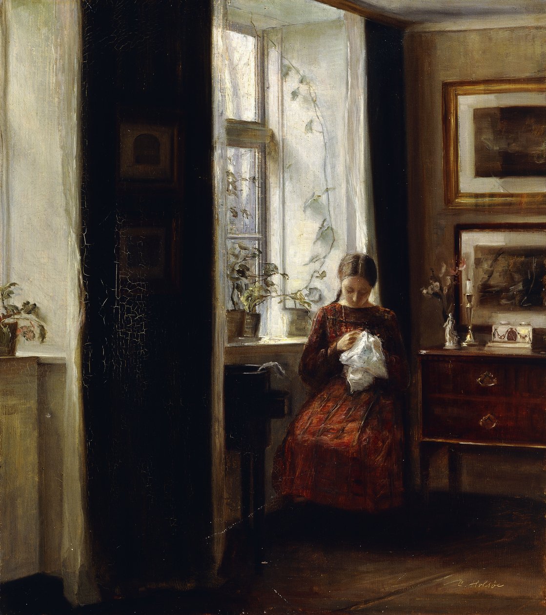 Mladá dívka šicí od Carl Holsoe