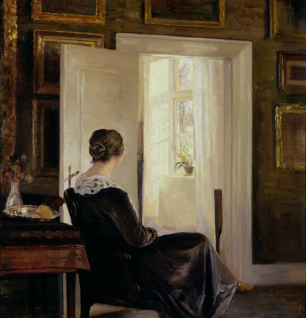 Žena sedící u dveří od Carl Holsoe
