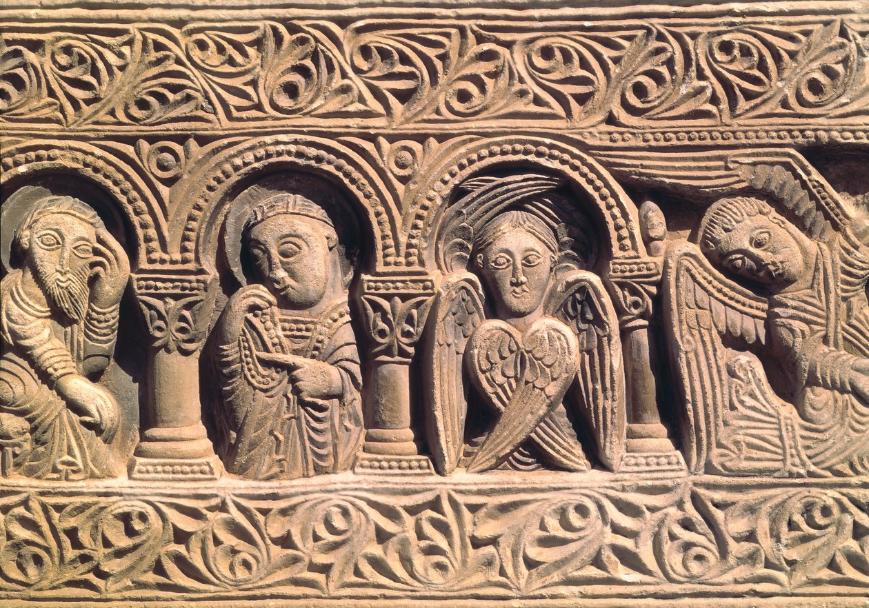Reliéf zobrazující světce se serafem, detail z nadpraží portálu od Catalan School