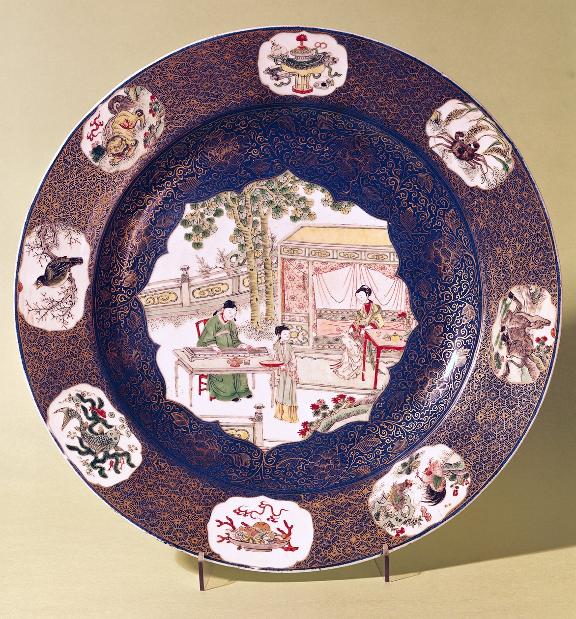 Kruhový talíř s hudební scénou, období Kangxi (1662-1722) (porcelán) od Chinese School