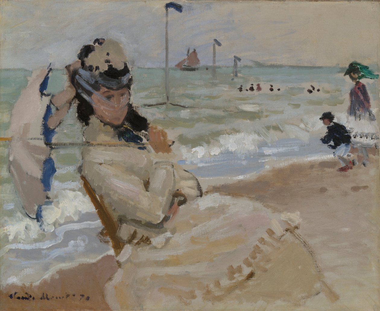 Camille na pláži v Trouville od Claude Monet