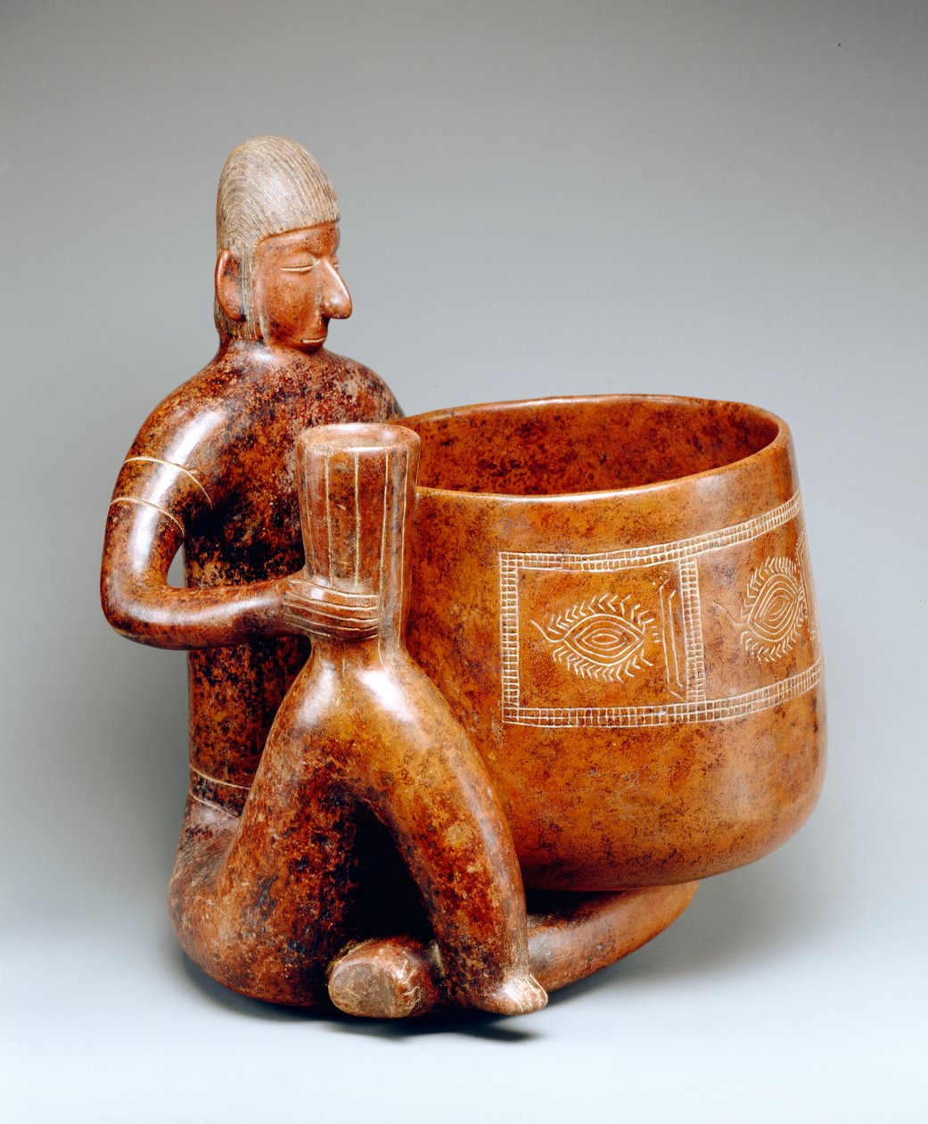 Sedící muž (kamenina) od Colima Culture