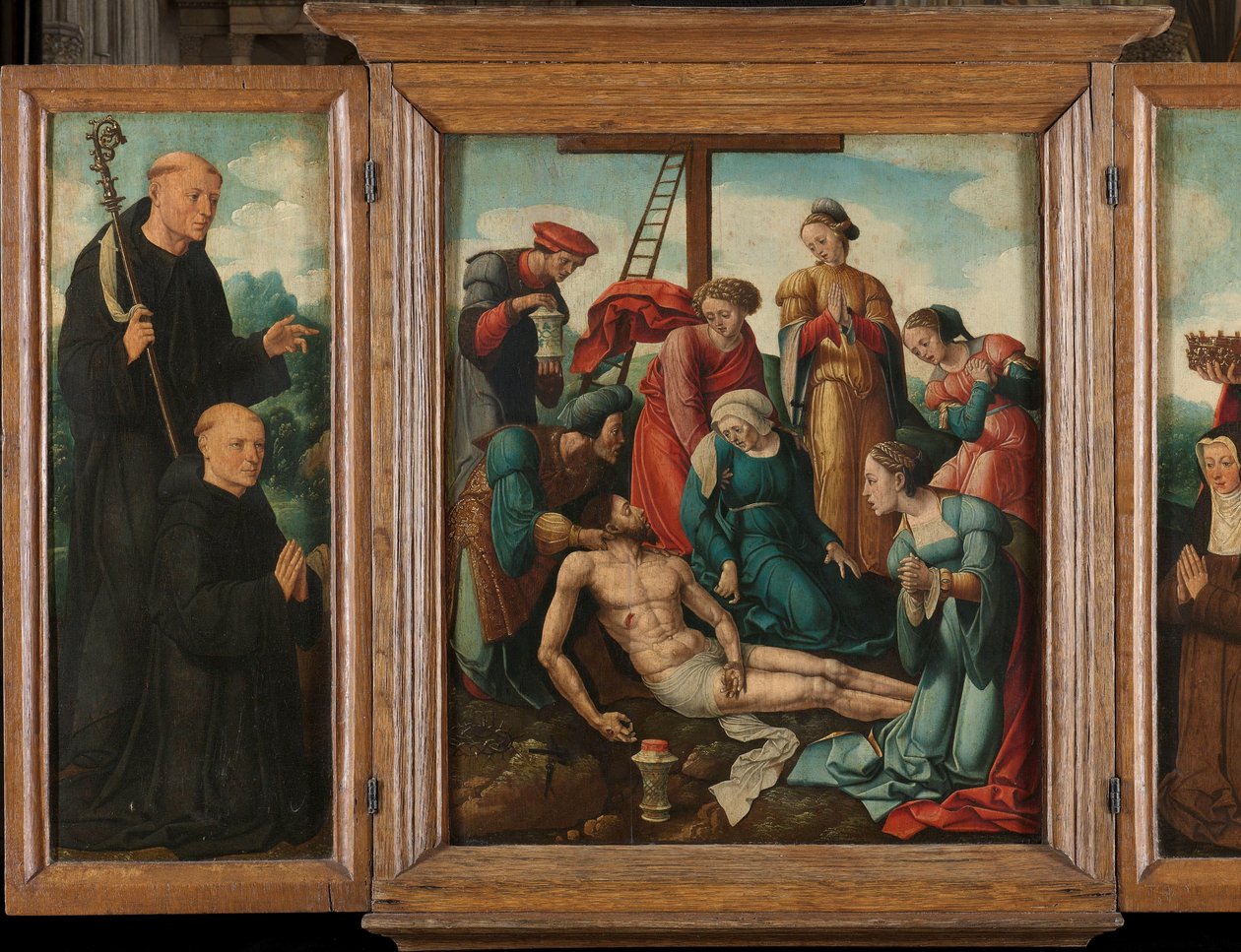 Triptych s Oplakáváním Krista (uprostřed), po stranách mužský dárce se svatým Benediktem (vlevo, vnitřní křídlo) a ženský dárce se svatou Alžbětou Durynskou (vpravo, vnitřní křídlo) od Cornelis Cornelisz II Buys (attributed to)