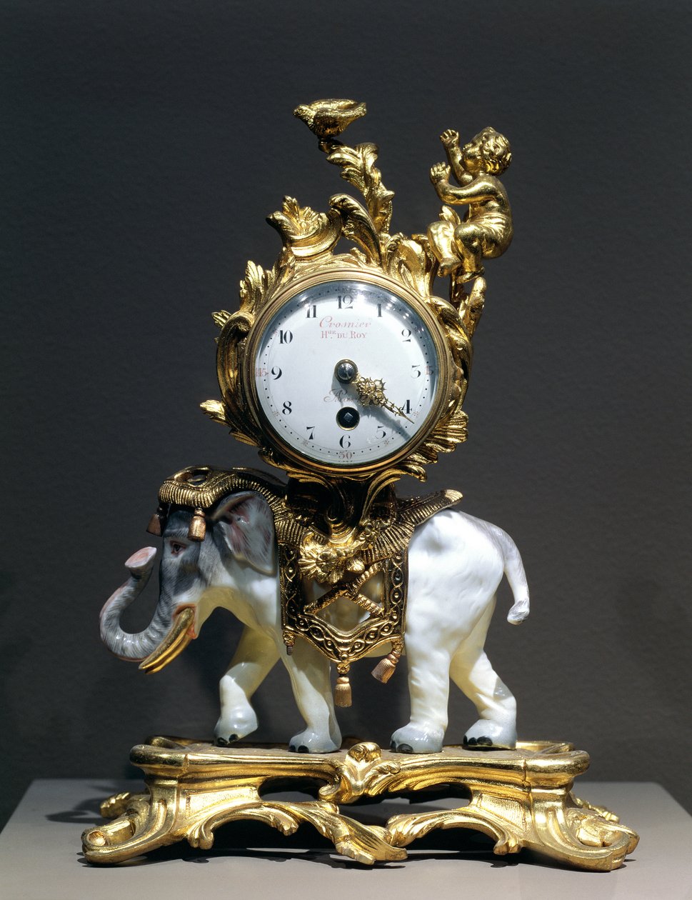 Stolní hodiny (zlacený bronz, porcelán, smalt a sklo) od Crosnier du Roy