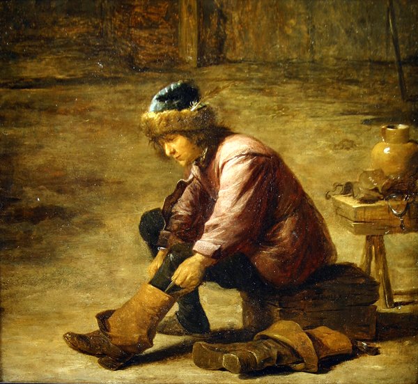Mladý muž si natahuje botu od David Teniers the Younger