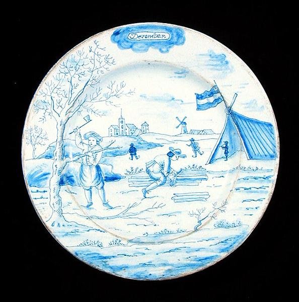 Delftware talíř zobrazující měsíc prosinec (cínem glazovaná kamenina) od Dutch School