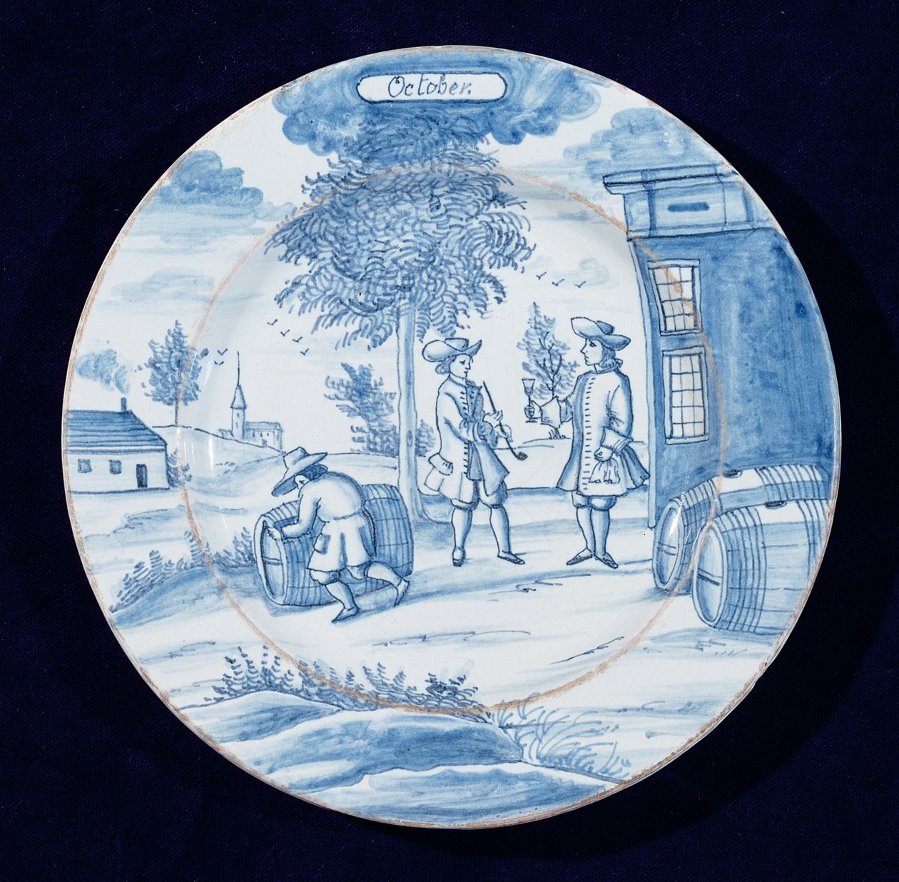 Delftware talíř zobrazující měsíc říjen (cínem glazovaná kamenina) od Dutch School
