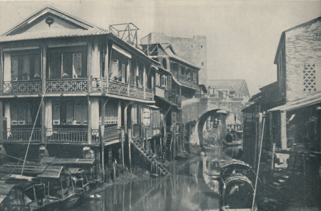 Zkažené vody pod mostem vedoucím k nemilým domovům chudoby a bolesti, c1935 od ENA