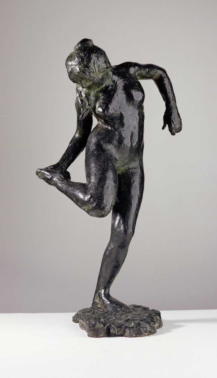 Tanečnice se dívá na chodidlo své pravé nohy (bronz) od Edgar Degas