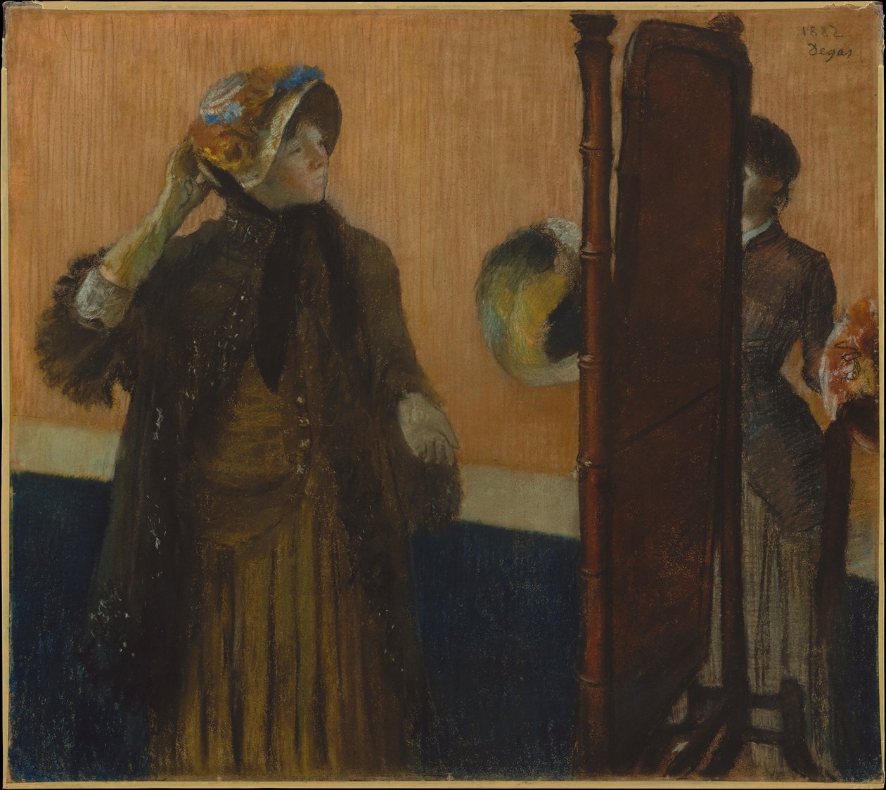 U kloboučnice od Edgar Degas