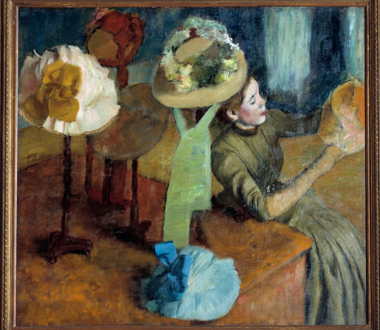 U mlynáře (nebo The Millinery Shop) od Edgar Degas