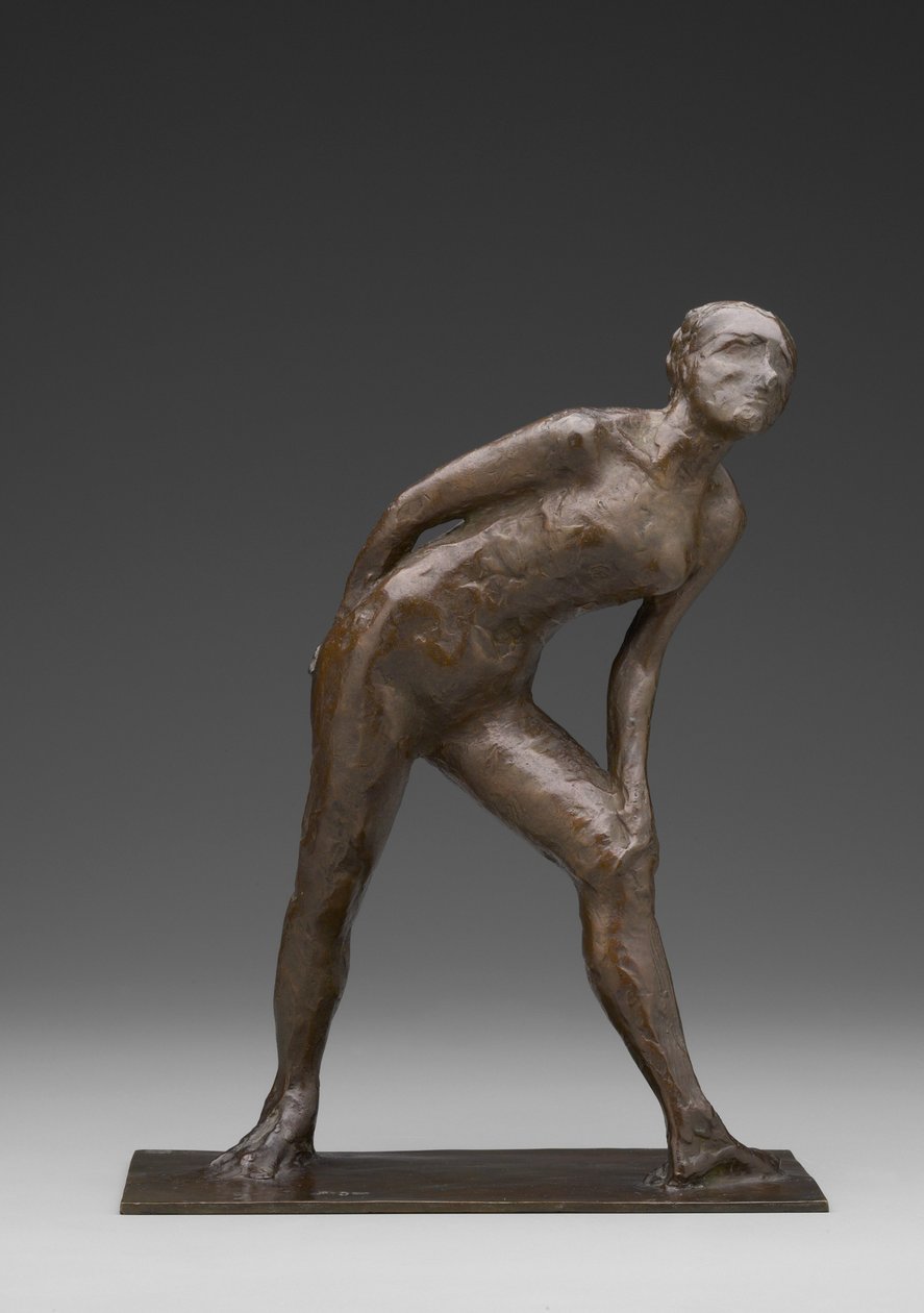 Tanečnice třít si koleno, známá jako tanečnice v roli Harlekýna (bronz) od Edgar Degas