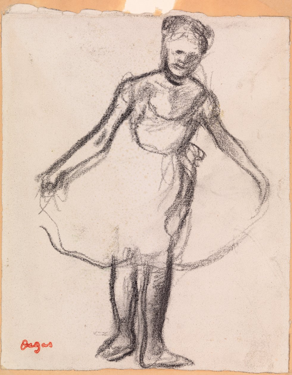 Stojící tanečnice držící Tutu sukni od Edgar Degas