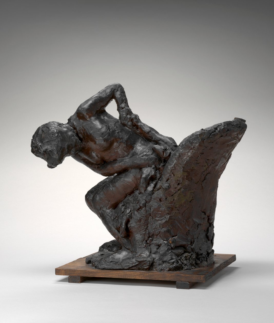žena sedící, otírá si levý bok od Edgar Degas