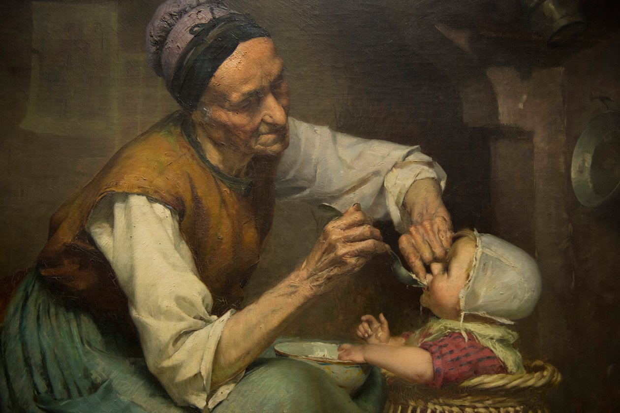 Stará žena krmí svou vnučku drženou v proutěném chodítku, Edouard Jerome Paupion od Edouard Jerome Paupion
