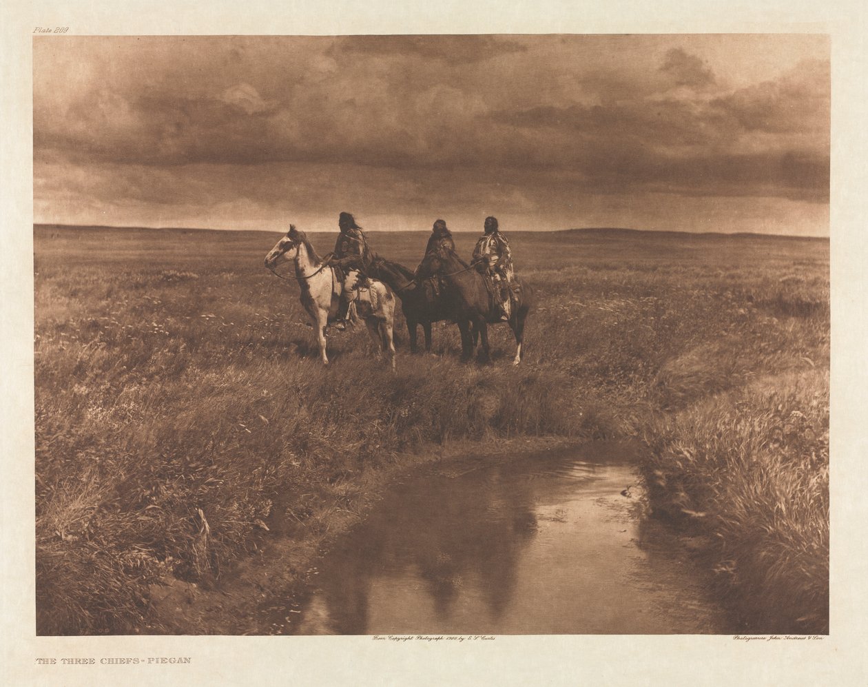 Portfolio VI, deska 209: Tři náčelníci - Piegan od Edward S. Curtis