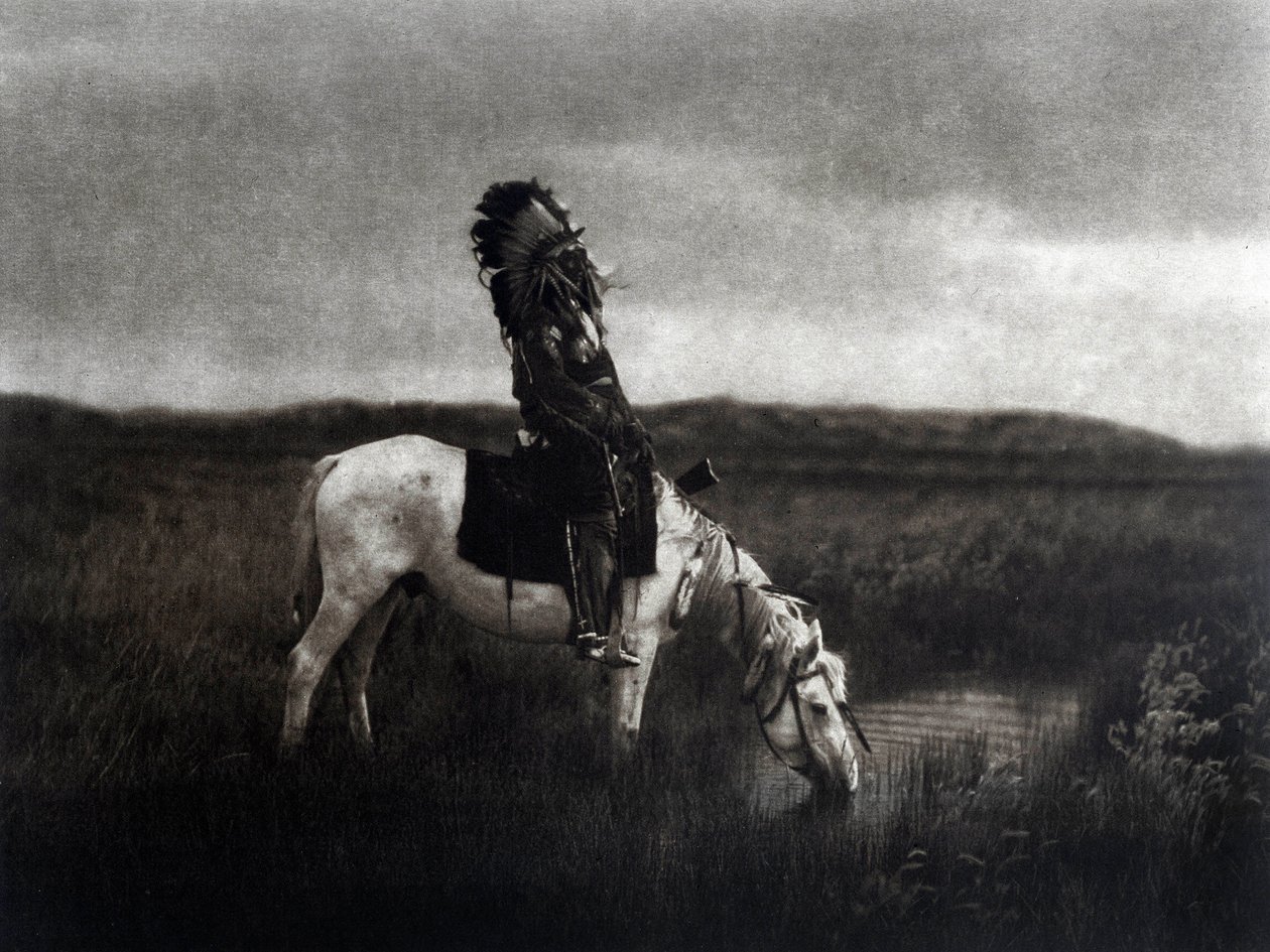 Indiánský válečník jezdící v pláni od Edward Sheriff Curtis