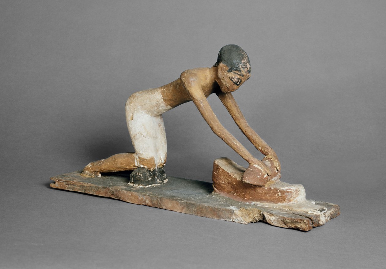 Model ženy, která mele kukuřici, egyptský, nalezený v Sidmant (polychromované dřevo) od Egyptian 6th Dynasty