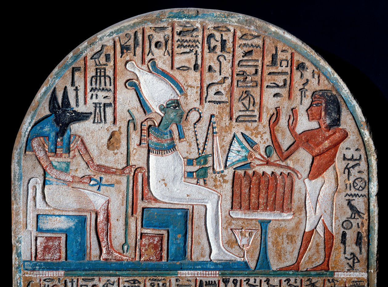 Egyptský starověk: stéla Nanai, představitel uctívající Osirise a Anubise, božstvo mrtvých, které drží klíč života ve tvaru kříže Ansee (Ankh). Malovaný vápenec. Konec 18. dynastie. 14. století před naším letopočtem. Turín, egyptské muzeum - Egypti od Egyptian 18th Dynasty