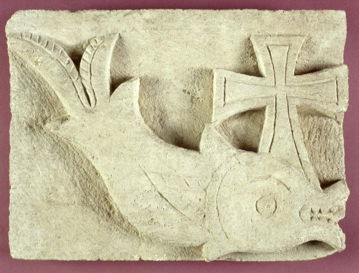 Reliéf delfína nesoucího kříž (vápenec) od Egyptian School