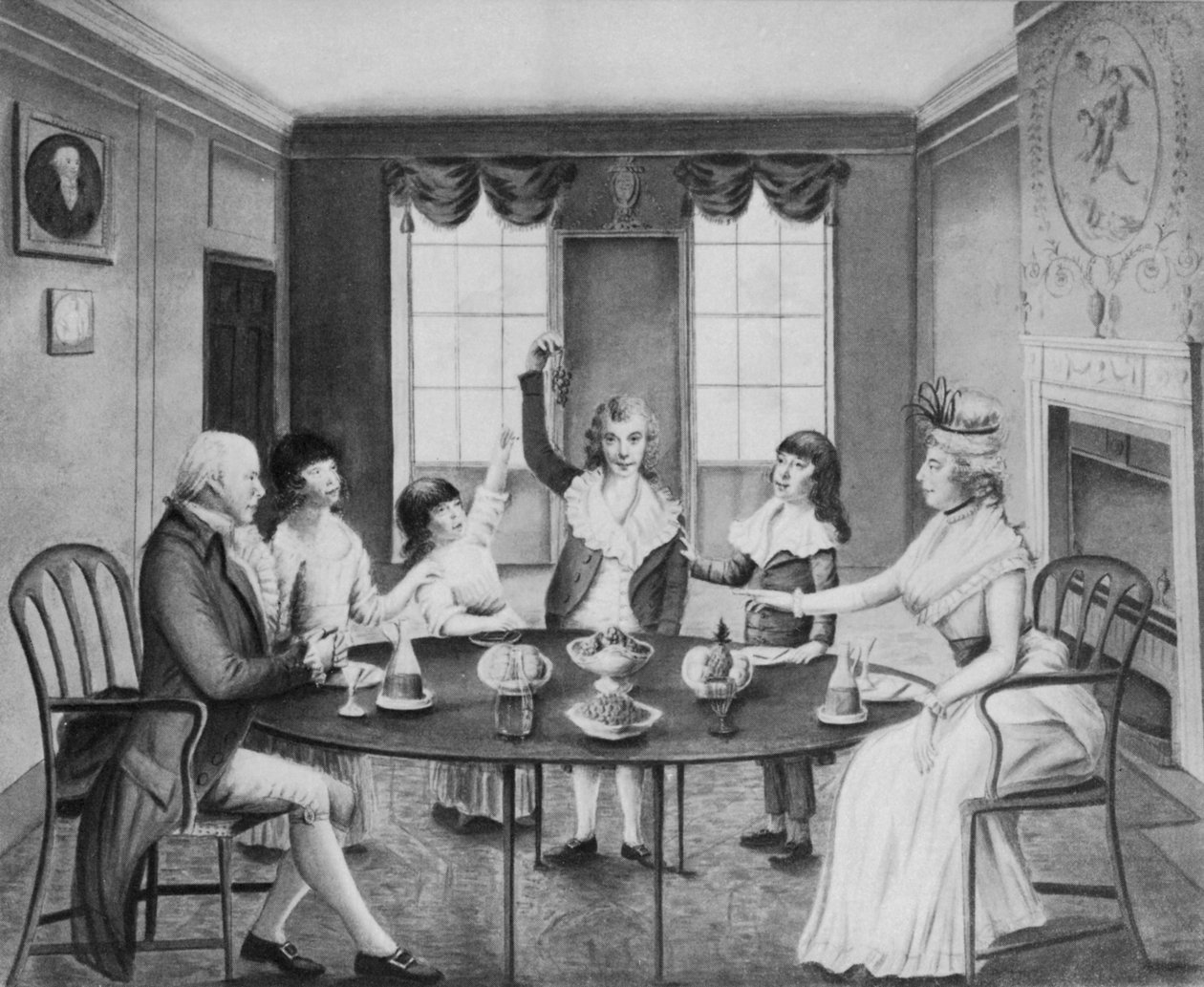 Interiér s dámou a pánem, kteří sedí u stolu a za ním stojí jejich čtyři děti, kolem roku 1780 od English School