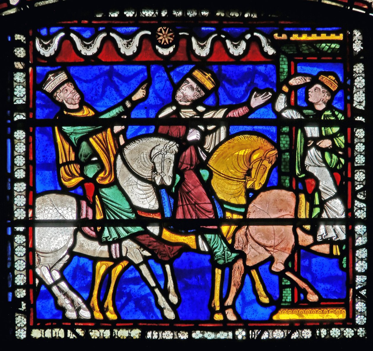Detail z jednoho z biblických oken, které znázorňuje Tři krále na koních, kteří následovali hvězdu. od English School