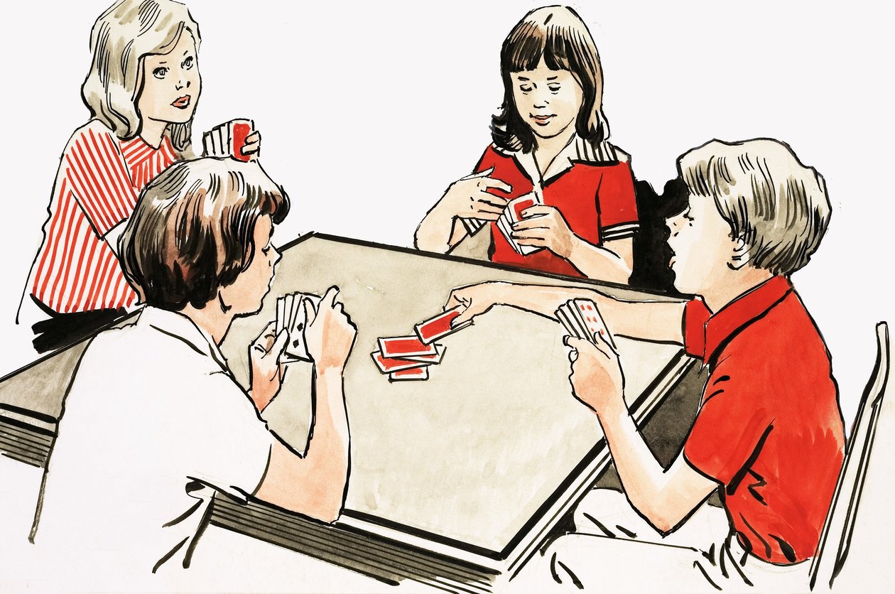 Čtyři děti hrají karty od English School