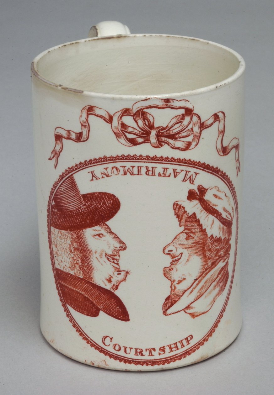 Vtipný hrnek zdobený obrácenými hlavami muže a ženy, kolem 1780 (krémové nádobí) od English School