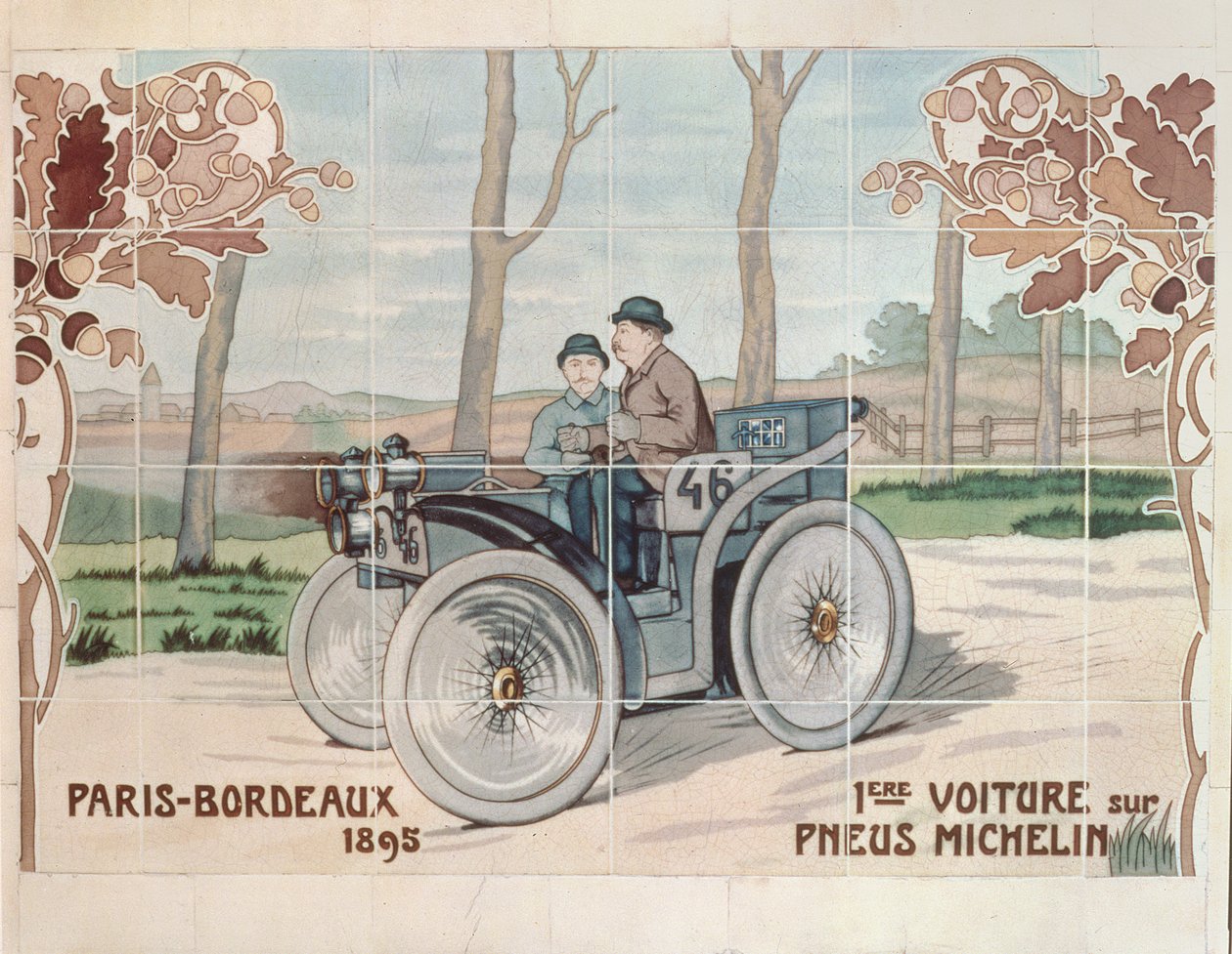 Edouard a Andre Michelinovi jedoucí s vozem L