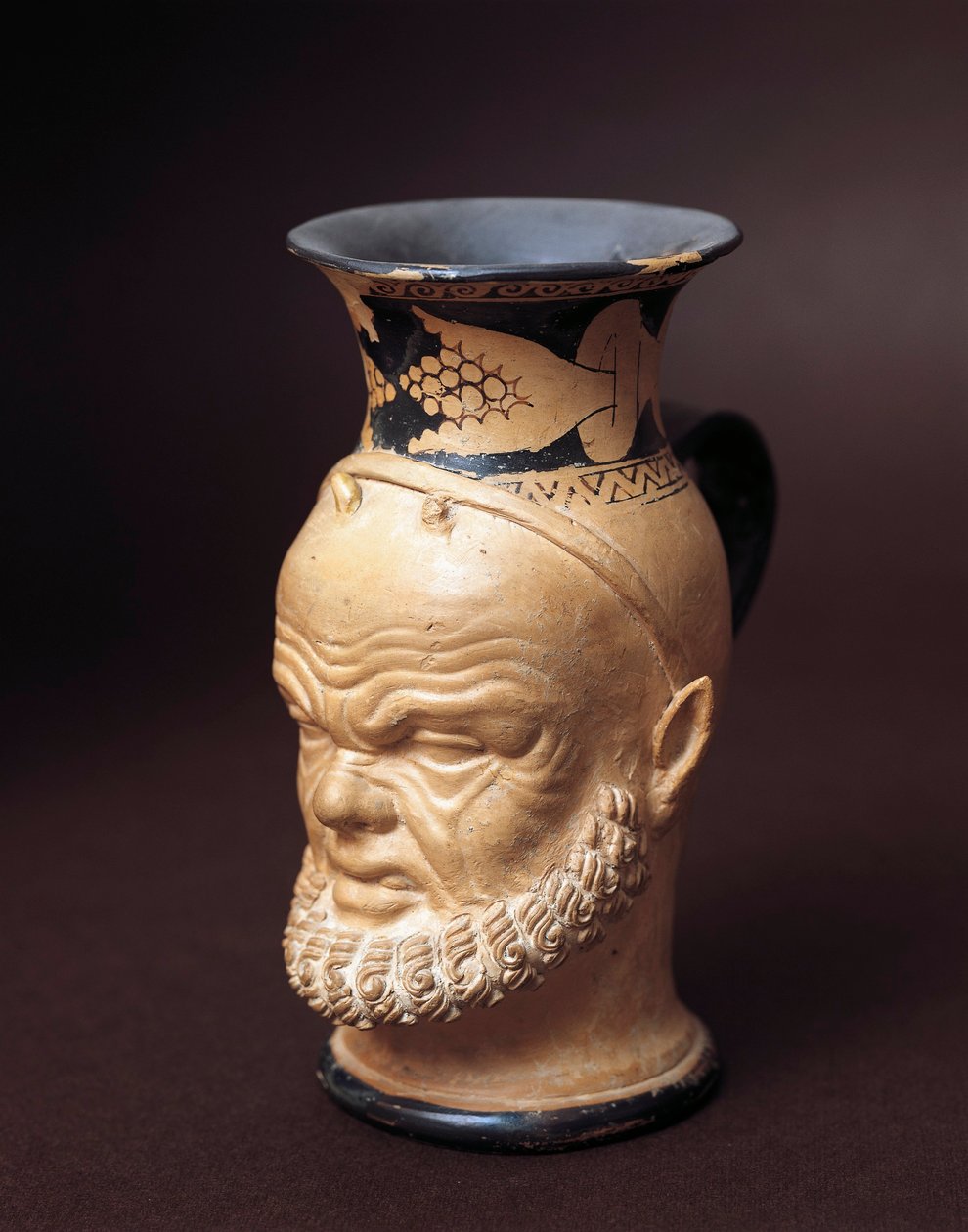 Etruská civilizace, váza s tváří Silena od Etruscan