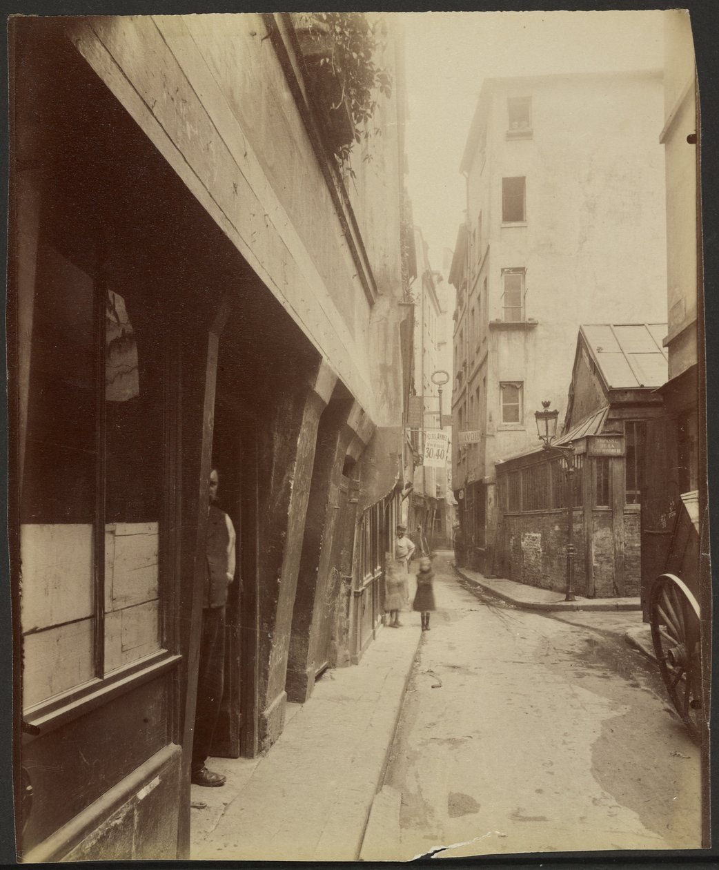 Na rohu Rue de Venise, č. 14 (4.) od Eugène Atget