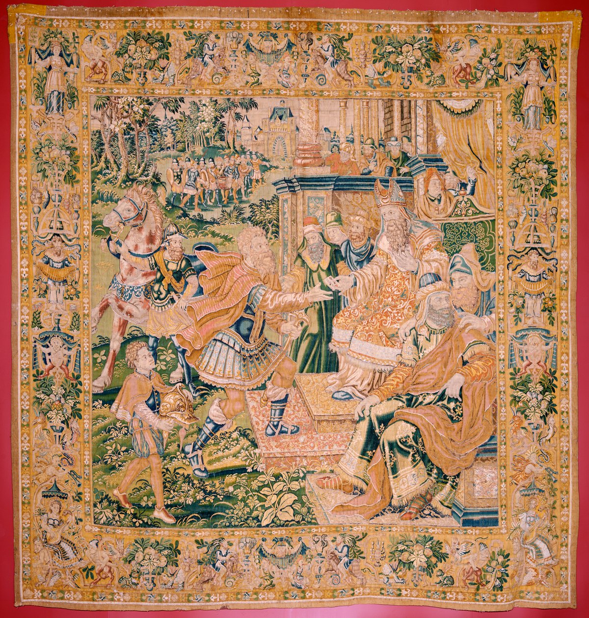 Vlámský gobelín. Série Kniha Judita. Válka přichází do Judy (Llega la guerra a Judá). Čtvrtá tapisérie v sérii. Výroba Nizozemsko, Brusel(?). Druhá polovina 16. století. Tkanina Vlna. Umístění Kostel svatého Mikuláše z Bari (muzeum o od Flemish School