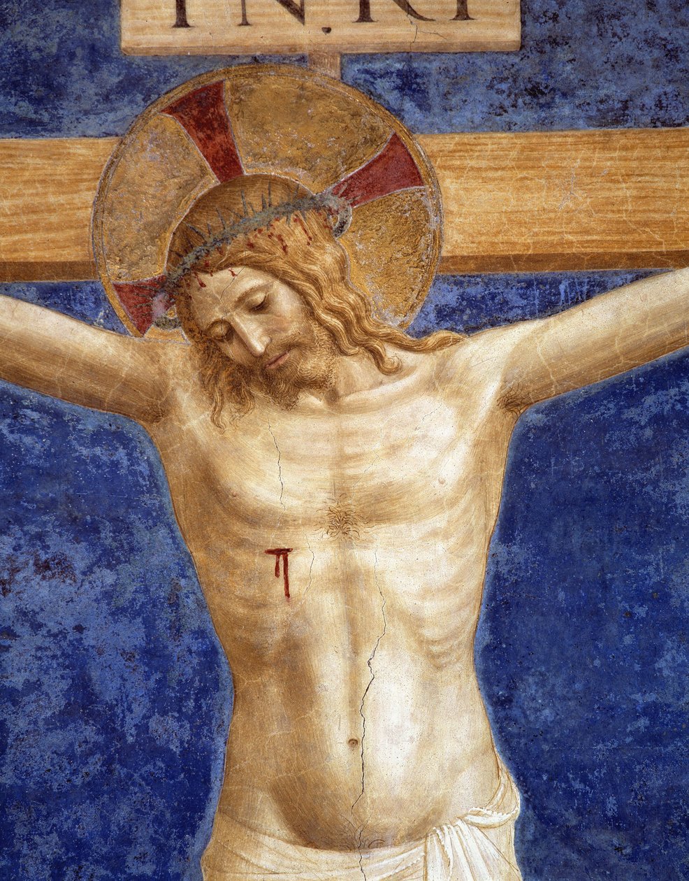 Kristus ukřižovaný. Nápis "INRI" na kříži, detail od Fra Angelico
