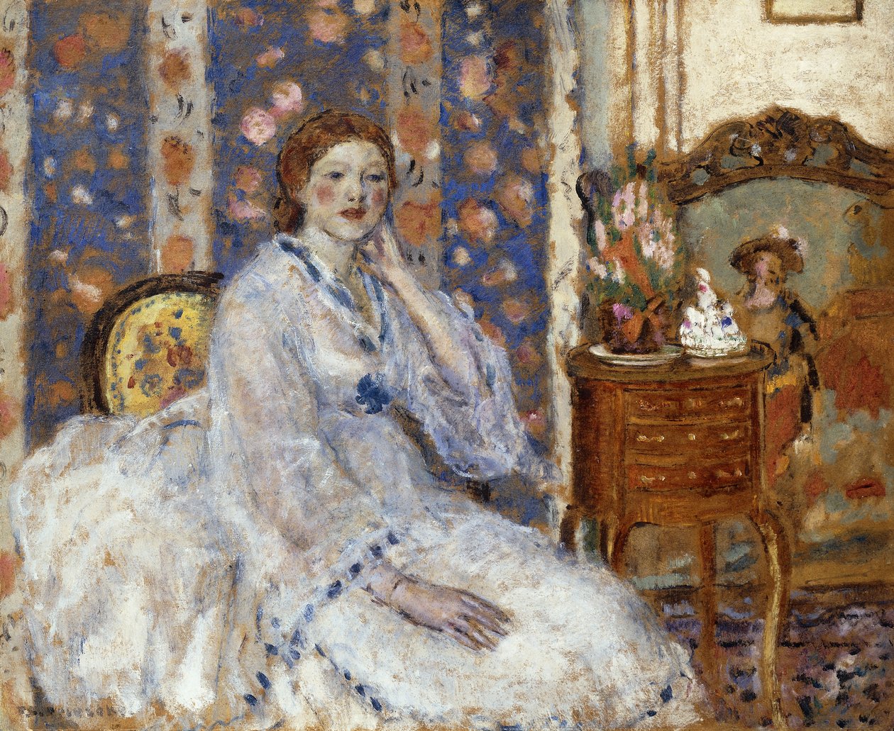 Žena sedí v křesle od Frederick Carl Frieseke