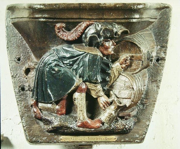 Misericord ze stánku chóru zobrazujícího muže testujícího víno, z kostela Saint-Etienne des Tonneliers, Rouen (polychromované dřevo) od French School