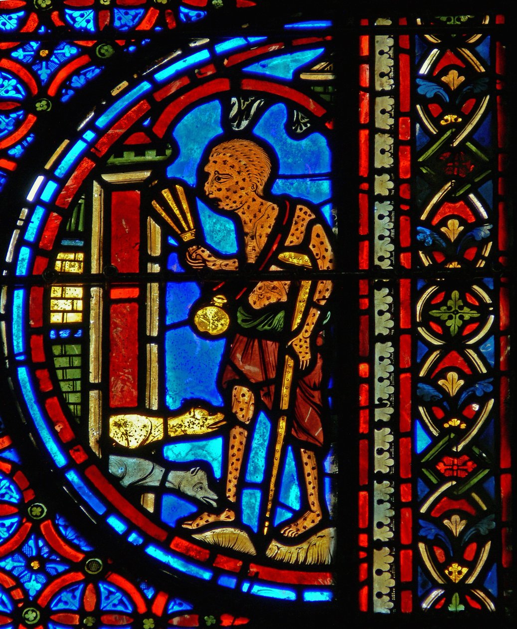 Detail z okna zobrazující podobenství o Lazarovi a ponorech od French School