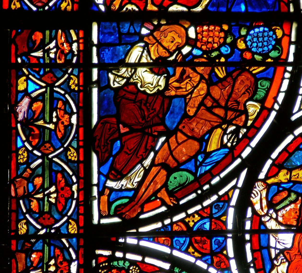 Detail okna s podobenstvím o milosrdném Samaritánovi: Stvoření Evy od French School