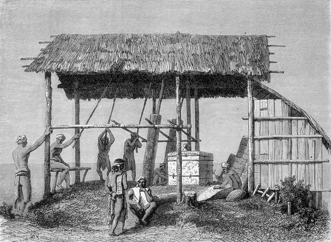 Ilustrace publikovaná ve vydání „Le Tour du monde“ z roku 1862 zobrazující kováře v dayacích na ostrově Borneo. Rytina. od French School