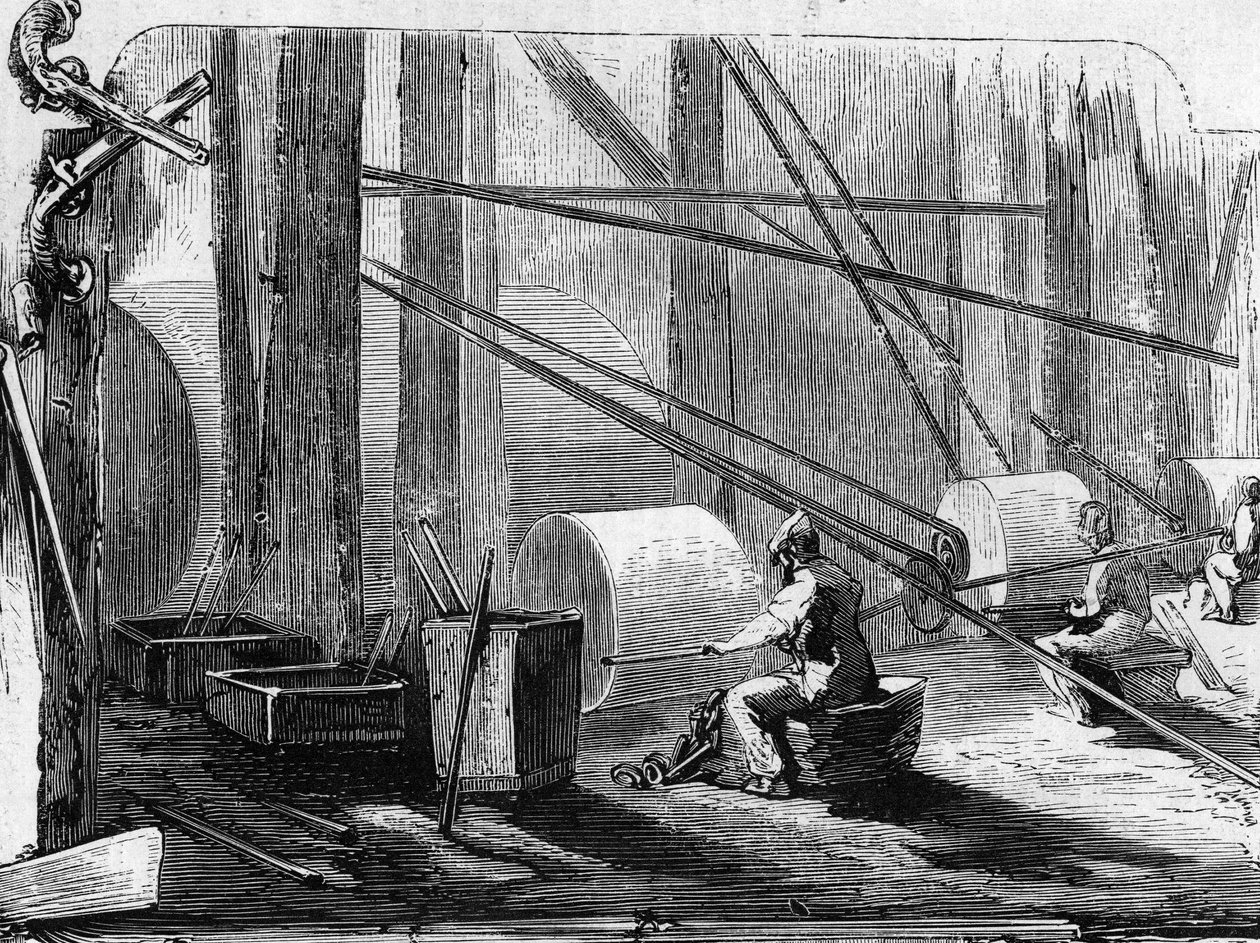 Výroba puškových zbraní: leštění železných válců s kamennými koly. Rytina v „“ Le Monde Illustré““ č. 35 z 12. prosince 1857. od French School