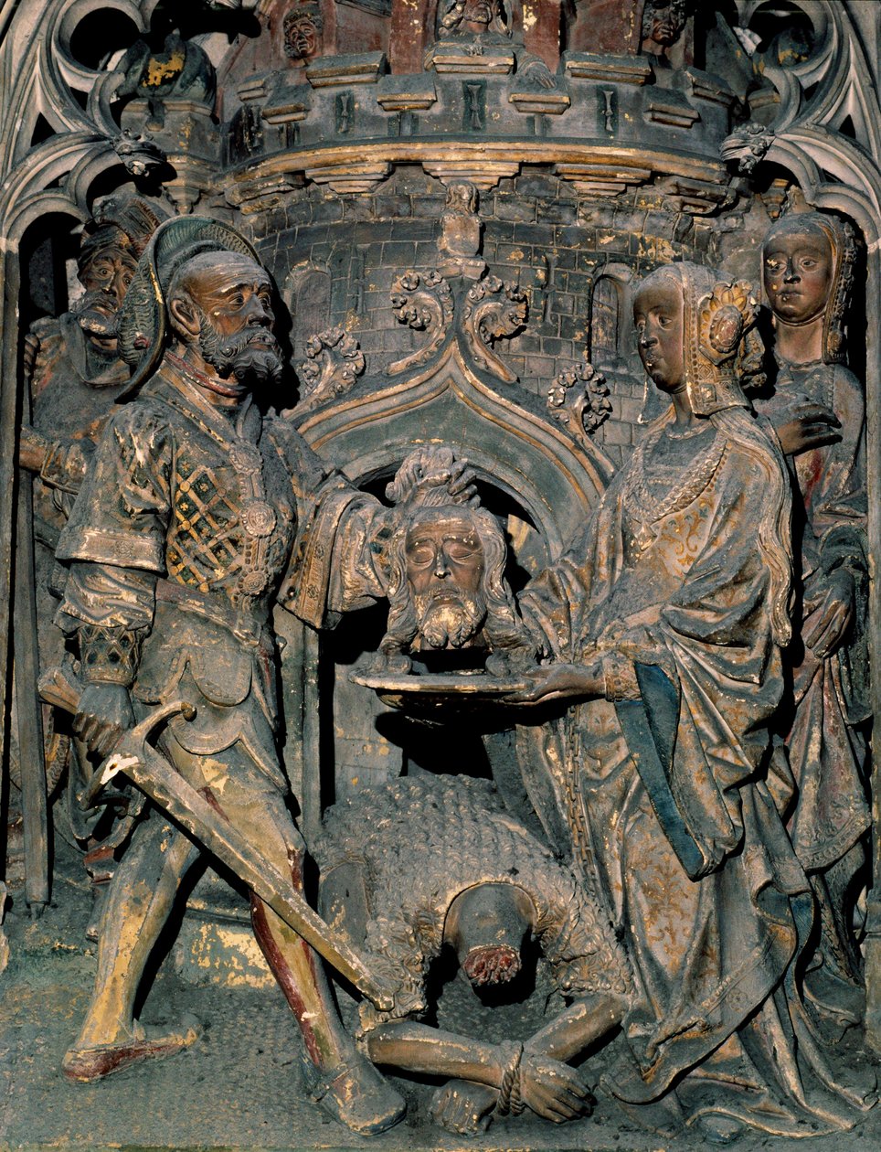 Smrt svatého Jana Křtitele Hlava Jana Křtitele je umístěna na plošině, kterou Salome daruje jeho matce. Vyřezávaný reliéf katedrály Notre-Dame d