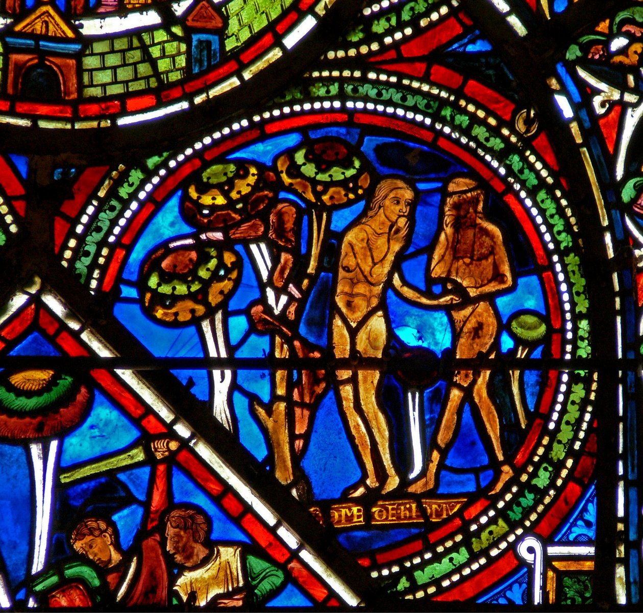 Okno w15 zobrazující okno Milosrdného Samaritána: Adam a Eva jedí zakázané ovoce od French School