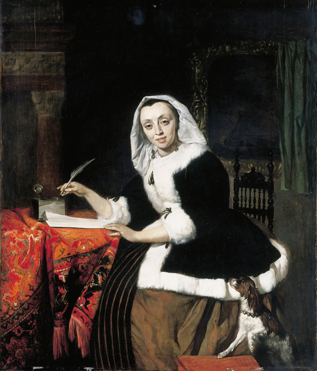 Elegantní dáma, která píše u svého stolu, se psem vedle ní od Gabriel Metsu